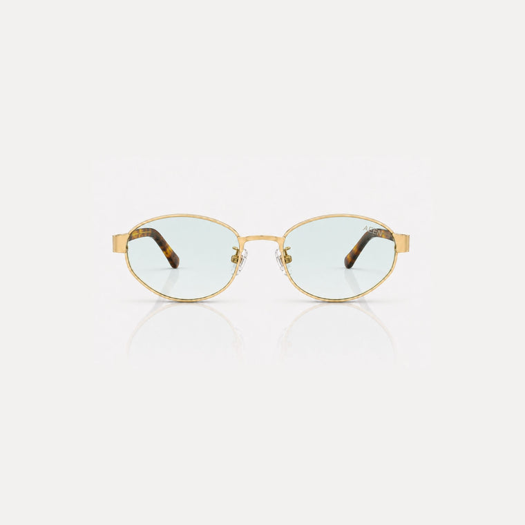 Aqua green | Angled three-quarter studio product shot of Aeen sunglasses featuring aqua green tinted lenses and sleek frames